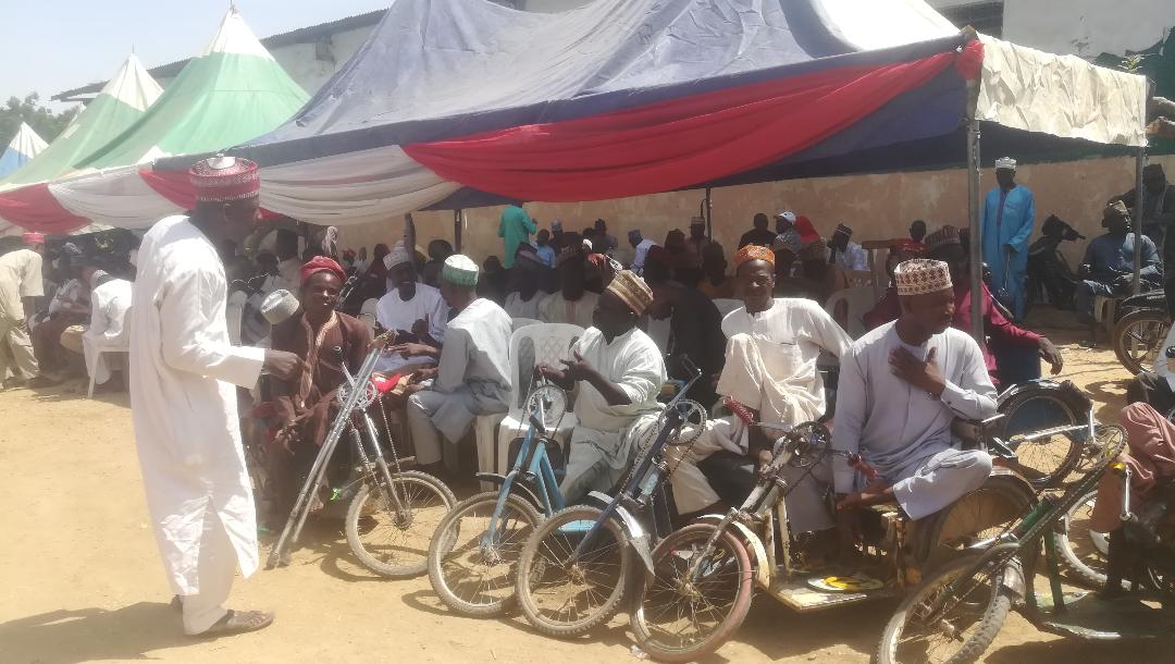 Some of the beneficiaries during the distribution of the palliatives at KASCO premises,  Farm Centre on Monday
