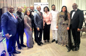 Abike Dabiri and others in the UK during the Avenue Impact Business Networking and Winter Ball at the Crown Plaza Hotel
