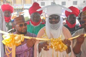 L-R: Executive Director with The Alternative Bank, Garba Mohammed and Emir of Kano, Alhaji Aminu Bayero during the inauguration of a branch of The Alternative Bank in Kano recently.