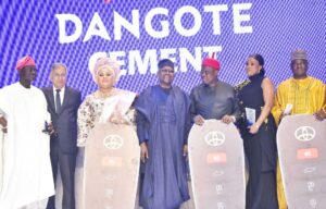 L--R, Former Minister of Industry, Trade & Investment, Otunba Niyi Adebayo, Dangote Cement Plc, New Share Holder, Femi Otedola, Chairman Dangote Cement plc, Aliko Dangote, Former Ekiti State Governor, Dr. Kayode Fayemi, at the Dangote Cement plc, Distributors Awards Nite in Lagos on Friday 26th January 2024.