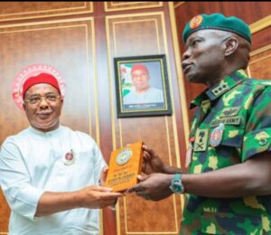 Governor Hope Uzodimma of Imo State (left), receives souvenir from the Chief of Army Staff, Lt. Gen Taoreed Lagbaja when the latter paid a courtesy call with his team on the Governor at Government House Owerri... Thursday.