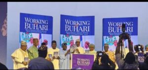 Former President Muhammadu Buhari , his successor, Bola Tinubu and others at the public presentation of the books