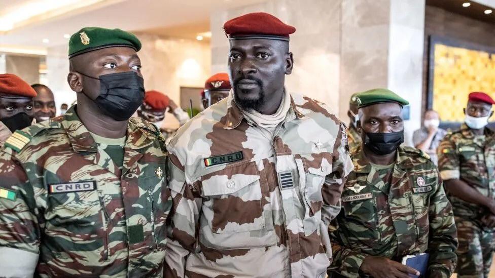 Guinea’s Military Leader, Gen Mamadi Doumbouya, center , with key loyalists
