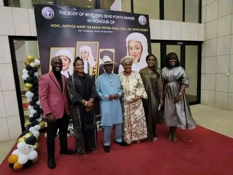 Justice Mary Odili, third right, her husband, Dr Peter Odili, third left and their children