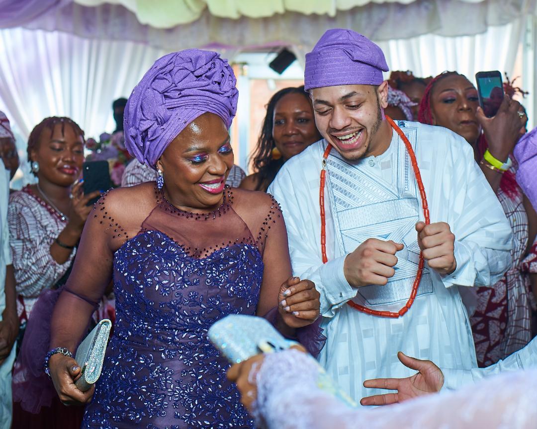 Lola Shoneyin and her son dancing