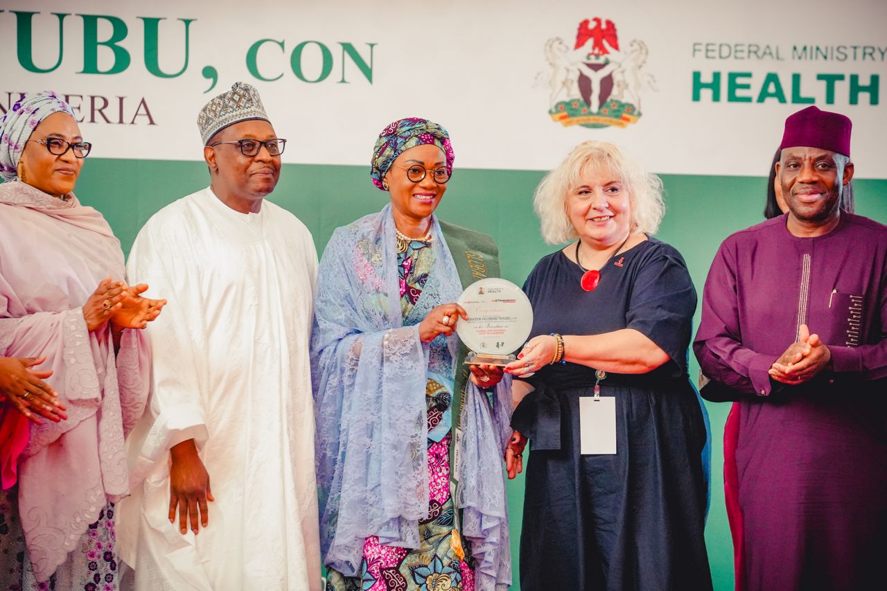 The First Lady, Oluremi Tinubu and others during her investiture as the Global and National Stop TB Champion at the State House Abuja.