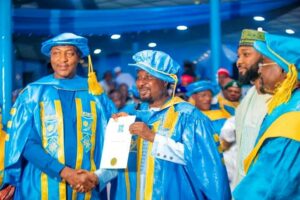 BUK Vice Chancellor, Prof. Adamu and Deputy Senate President, Dr. Barau Jubrin. Dr. Jubrin was receiving certificate of Honourary Doctorate degree, awarded to him by BUK, on Saturday, during her 38th convocation ceremony