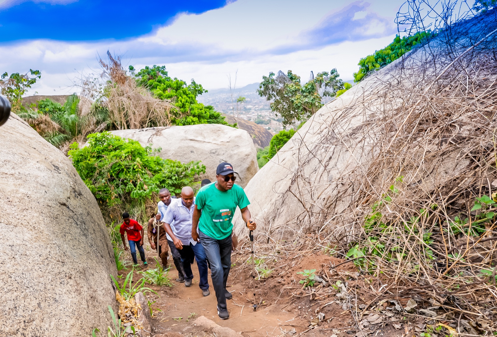 Governor Oyebanji leading others on the climb to Oke Abanijorin