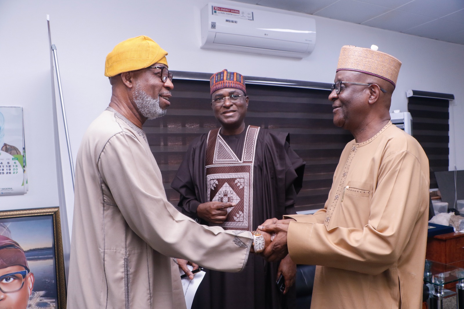 L-R: Minister of Solid Minerals Development, Dr. Dele Alake, former Governor of Bauchi State, and Chairman, Board of Trustees of the All Progressives Congress (APC) Professionals Forum, Dr. Isa Yuguda and former Governor of Adamawa State and member Board of Trustees of the All Progressives Congress (APC) Professionals Forum, Bala Ngilari during a visit to the Hon. Minister in his office in Abuja, April 18, 2024.