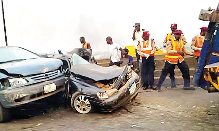 Road safety officials at the scene of road accident