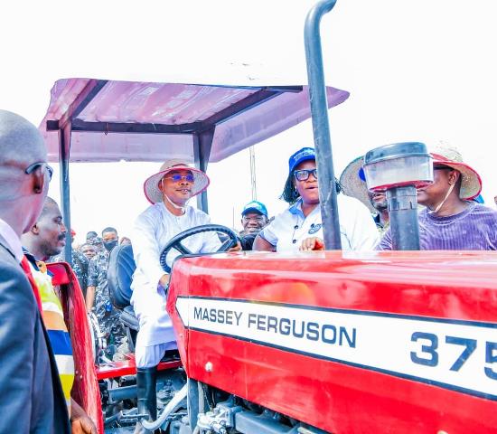 Governor Ododo with one of the tractors for Kogi farmers