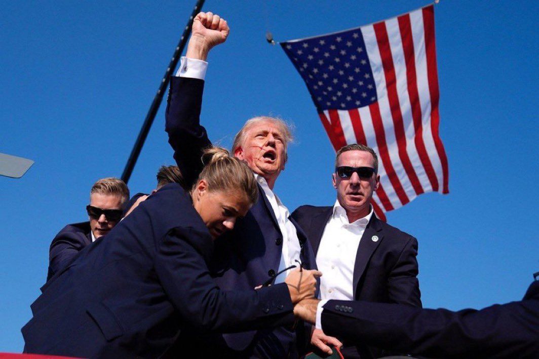 Donald Trump being taken away be secret agents