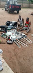 The suspects and their weapons.jpg
