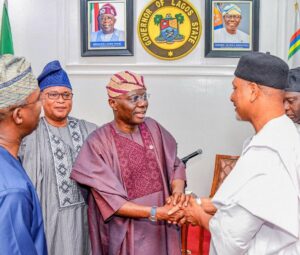 Governor of Lagos State, Mr. Babajide Sanwo-Olu (middle) exchanging greetings with a member of the Senate Committee on Marine Transport and Blue Economy, Senator Saliu Mustapha (right) while the committee chairman, Senator Wasiu Eshinlokun Sanni (left), watches during a courtesy call to the Governor at the Lagos House, Ikeja, on Thursday, 43 July 2024.