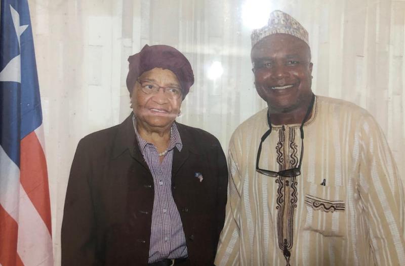 Abubakar Hashim with President Sirleaf of Liberia in 2016.jpg