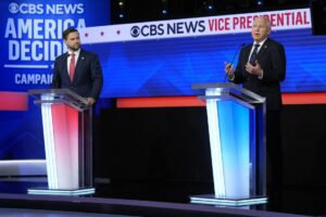 Republican vice presidential nominee Sen. JD Vance, R-Ohio, and Democratic vice presidential nominee Minnesota Gov. Tim Walz participate in vice presidential debate hosted by CBS News Tuesday, Oct. 1, 2024, in New York. (AP Photo/Matt Rourke)