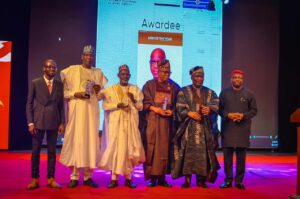 L-R: Publisher of NewsDirect, Mr Mathew Ibiyemi; representative of the Governor of Borno State, who is the winner of the NewsDirect Governor of the Year award (Nationwide) and Borno State Commissioner of Information and Internal Security, Professor Usman A. Tar; representative of the Jigawa State Governor, who is the winner of the NewsDirect Governor of the Year award (Agro-investments and security) and, Secretary to the State Government, Mallam Bala Ibrahim; representative of Governor Dapo Abiodun and winner of the NewsDirect Man of the Year award and Special Adviser to the Governor on Media and Strategy, Hon.Kayode Akinmade; winner of the NewsDirect Corporate Icon of the Year award and Chairman of Odua Investment Company Limited, Otunba Bimbo Ashiru and representative of the Lagos State Governor and Commissioner for Information and Strategy, Mr. Gbenga Omotoso, at the Nigerian NewsDirect's 14th anniversary lecture and awards ceremony held in Lagos, on Friday.