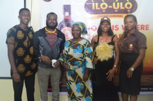 L-R: One of the winners at the Isiagu Café Liquior Home Coming ( ilo- Ulo) digital contest for Eastern region indigenes, Ikewe Sixtus Uchechukwu; Marketing Manager, Fountain Head, Grand Oak Ltd, Gbemileke Lawal; Another winner, Felicia Chioma Annie; another lucky winner, Samuel Alaoma; Senior Brand Manager ISIAGU, Nnenna Uche-Onyenacho at the winners unveiling and free return flight tickets to the ten winners of the contest held in Lagos