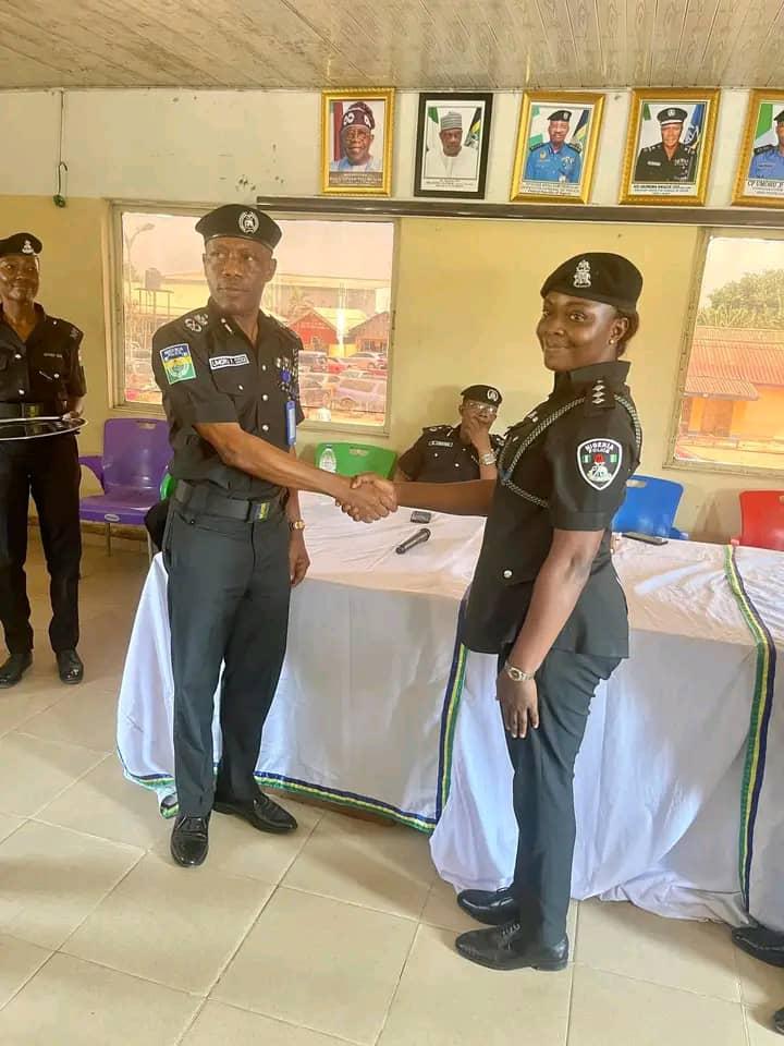 CP Ozigi congratulating DSP Jennifer Iwegbu.