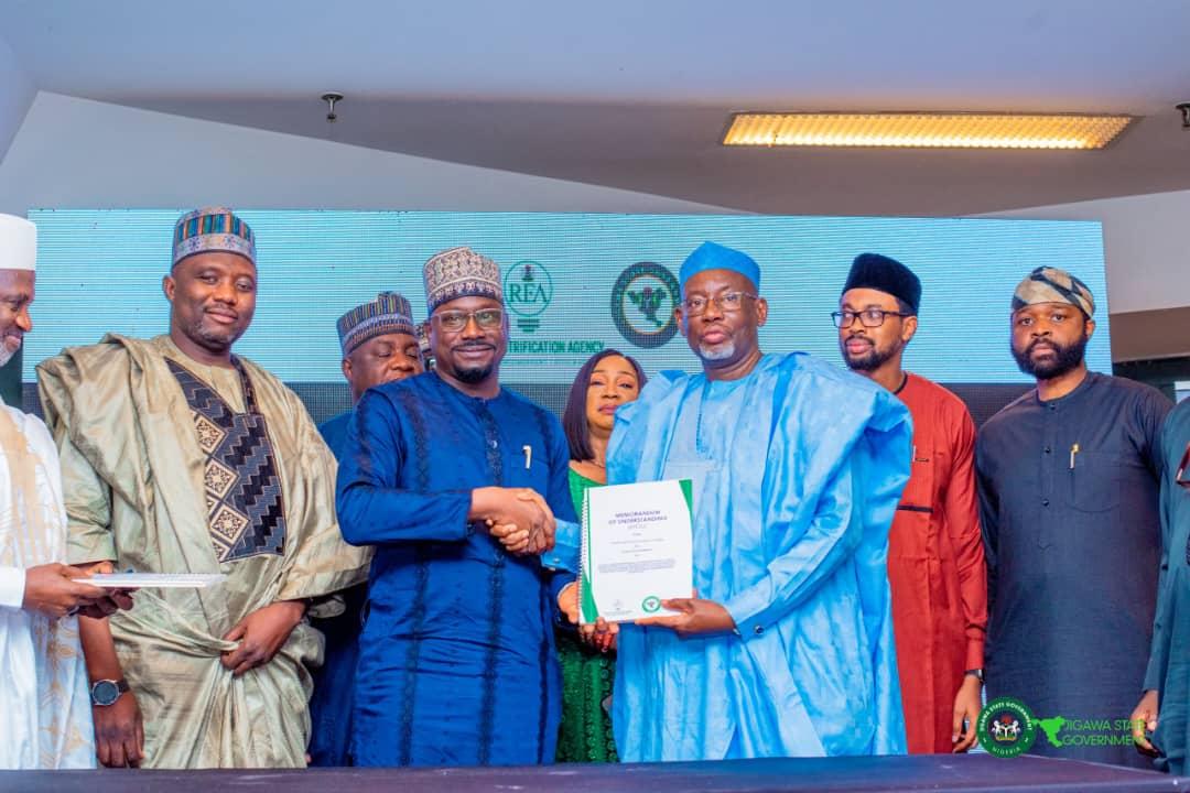 Governor Namadi and the management team of REA after signing the MOU