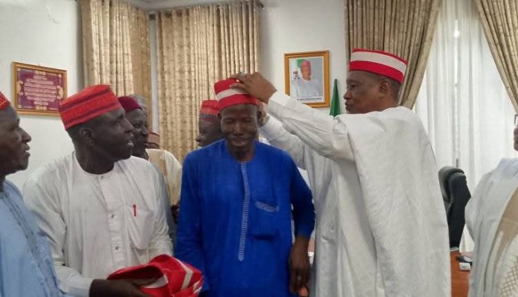 One of the defectors being decorated with a Kwakwasiya cap