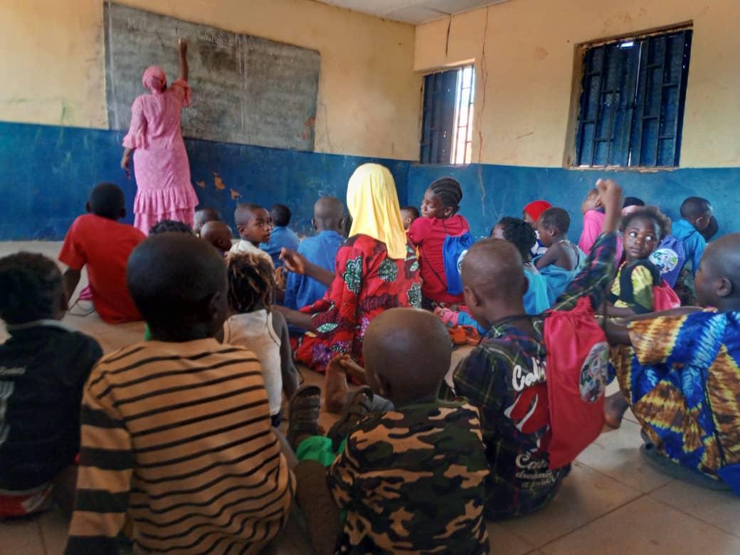 Pupils sit on the floor in one of the Kogi schools