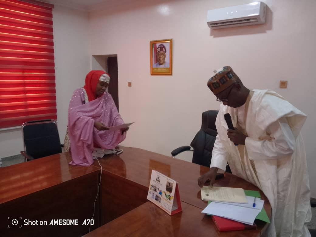 Dr. Fa'izah and Jalo during the inauguration of the Committee