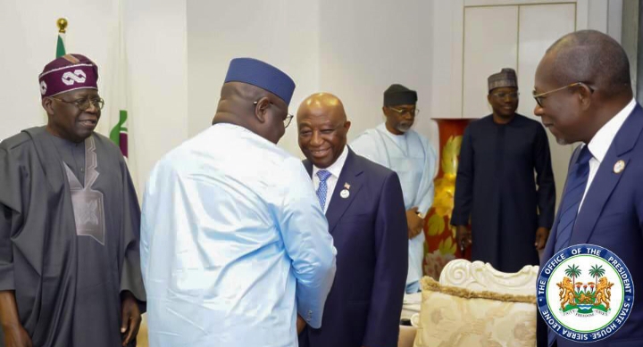 President Bio shaking hands with Liberia’s President Boakai, while President Tinubu, others, look on
