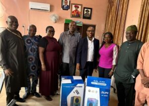 From left: Senior Lecturers, Prof. Kolawole Bashir, Dr. Kehinde Atoyebi, and Dr. (Mrs.) Abari; Head of the Department of Economics, Prof. Fatai Ogunlana; LASUECO_2000 Secretary, Mr. Busayo Ajakaiye; the Vice President, Mrs. Winifred Nnoduo; and Dean of the Faculty of Social Sciences, Prof Olufemi Lawal, when LASUECO_2000 Alumni set donated two sets of PAS to the Economics Department at LASU