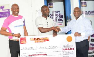 Branch Manager, FCMB Ughelli, Mr. Paul Onoroha; N1 million winner in the 5th draw of the FCMB Millionaire Promo Season 10, Mr. Israel Oruma; and Branch Manager, FCMB Warri 1, Mr. Henry Emelife, at the cheque presentation ceremony held in Ughelli, Delta State.