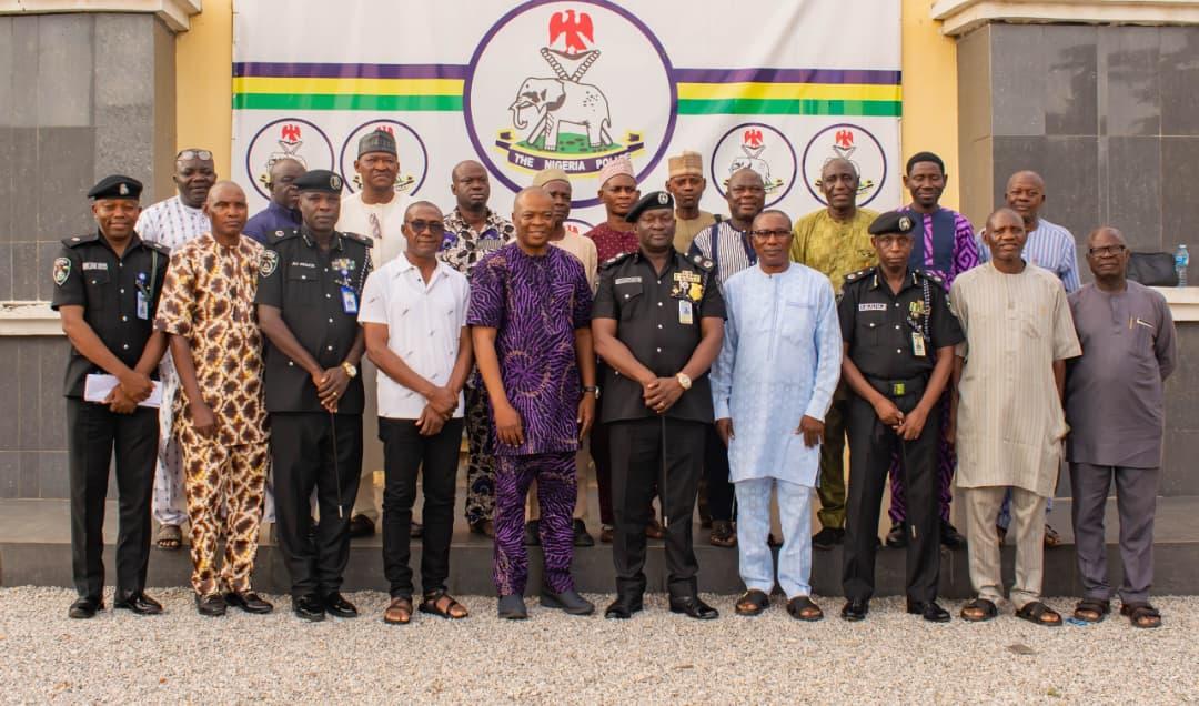 Kogi CP, Miller Dantawaye, in a group photograph with journalists