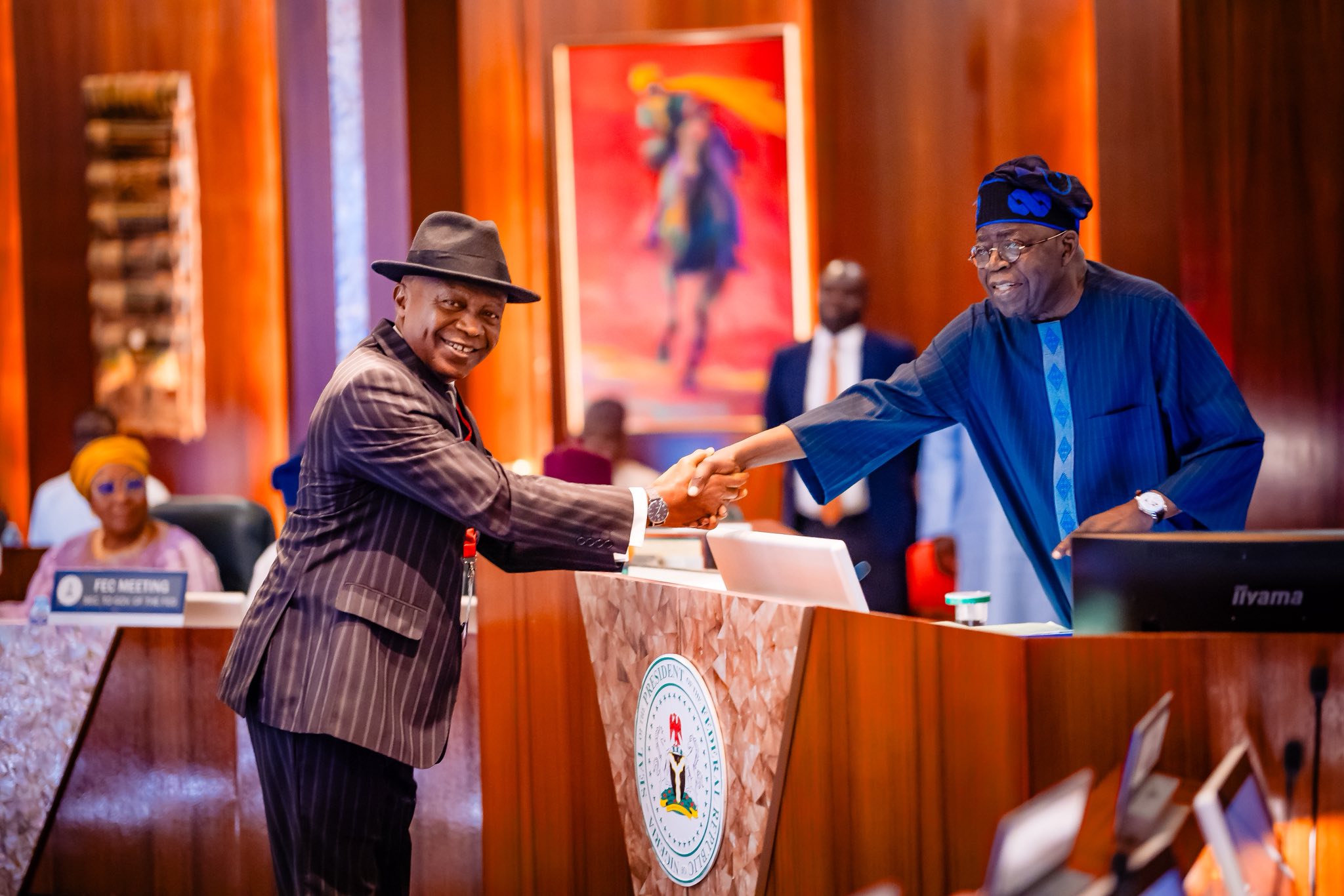 Pesident Bola Tinubu, right, at the FEC meeting