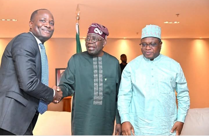 From left, SEC Director-General Dr. Emomotimi Agama, President Bola Tinubu and NGX Group Chairman, Alhaji Umaru Kwairanga