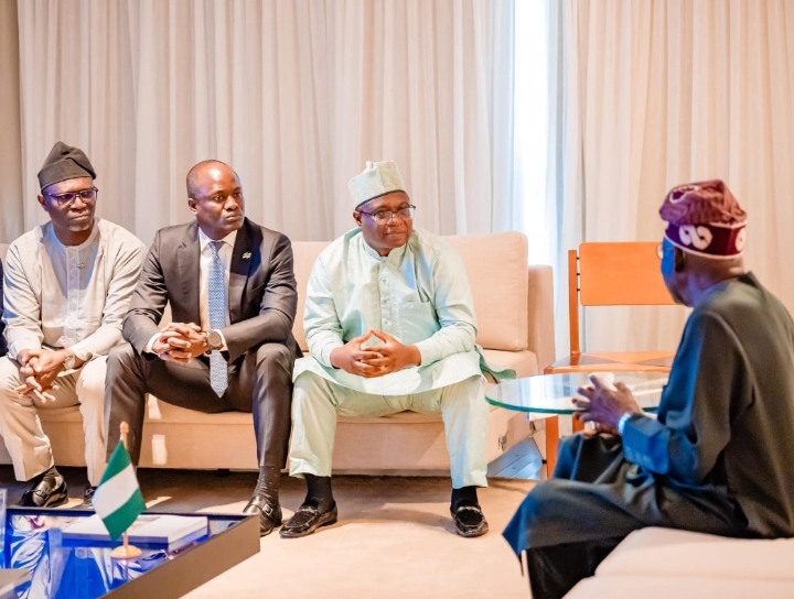 President Tinubu, right, SEC Director-General, Dr. Emomotimi Agama, President Bola Tinubu and NGX Group Chairman, Alhaji Umaru Kwairanga and another official