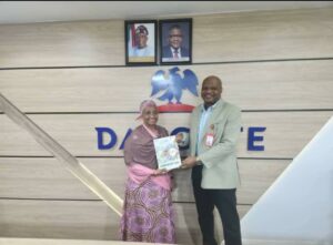 Senior Adviser to the President of Dangote Group Fatima Wali Abdurrahman(L), and the Director General of the Abuja Chamber of Commerce and Industry(ACCI) Dr. Agabaidu Jideani, during his visit to the Dangote Group's regional office in Abuja recently