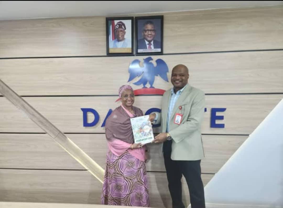 Senior Adviser to the President of Dangote Group Fatima Wali Abdurrahman(L), and the Director General of the Abuja Chamber of Commerce and Industry(ACCI) Dr. Agabaidu Jideani, during his visit to the Dangote Group's regional office in Abuja recently