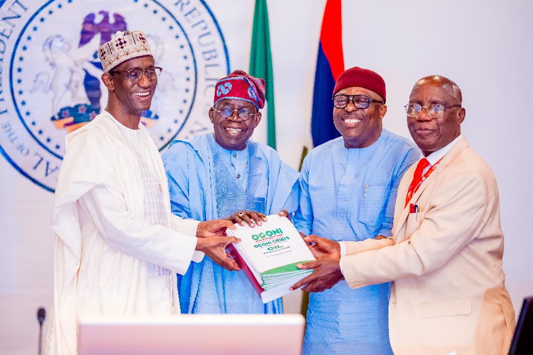 President Tinubu receiving the report of the Presidential Committee on the Ogoni Consultations, chaired by Professor Don Baridam (right). With him are Nuhu Ribadeu, left, and Go Fubara