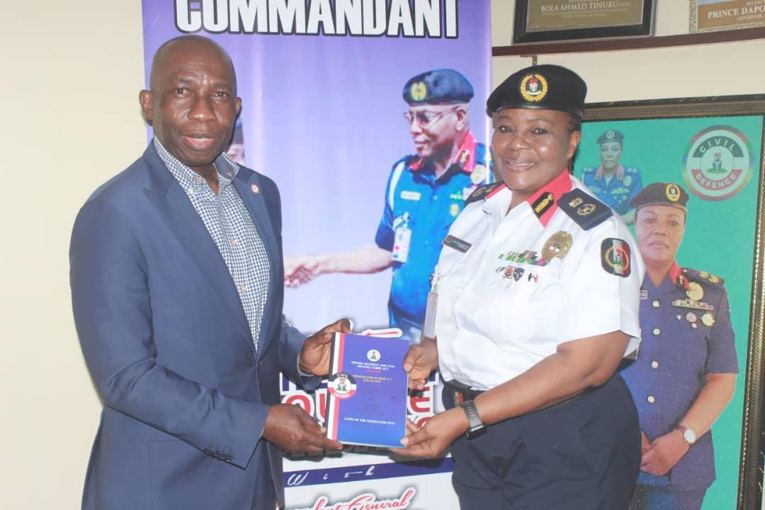 Dr John Asein and Commandant Remi Ekundayo