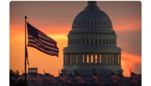 The dome of the U.S. Capitol is seen at sunrise, Oct. 1, 2025, in Washington. Mark Schiefelbein/AP