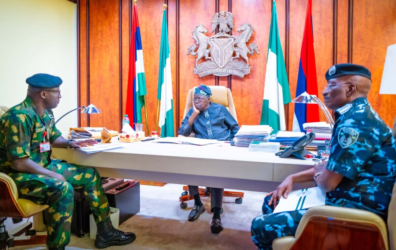 President Tinubu, centre, with the Police and Army Chiefs