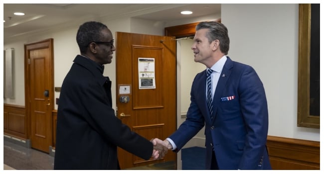 United States Defense Secretary, Pete Hegseth, greets Nigeria’s National Security Adviser, Nuhu Ribadu. Credit: X/@SecWar
