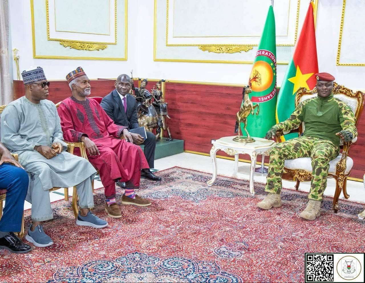 Traore, Tuggar and others at a meeting to resolve the matter