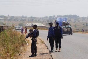 Members of the Civilian Joint Task Force stand guard during a drill near a bush in Minna, Niger state, Nigeria, on November 29, 2025. Vigilante groups have stepped in to fill security gaps as rural communities face rising attacks and abductions by armed gangs. Marvellous Durowaiye/REUTERS