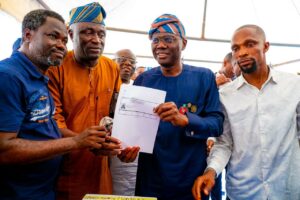 Governor of Lagos State, Mr. Babajide Sanwo-Olu (second right); Agent Ward E3, Lawrence Oriolowo (right); Ward Chairman, Saheed Olorogun Etti (second left) and Senatorial Admin, E-REG APC, Patrick Oyadiwa (left) during the governor's membership e-registration of APC at St. Stephen Primary School, Thomas in Lagos Island, on Tuesday, January 06, 2026.