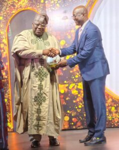Prof. Tunji Olaopa, Chairman, Federal Civil Service Commission, receiving the Oyo State Merit Award from HE Governor Seyi Makinde in Ibadan on Tuesday, to mark the Grand Finale of Oyo State at 50 Anniversary.