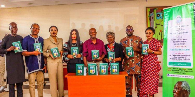Clark's family and organizers of the event during the unveiling of the book