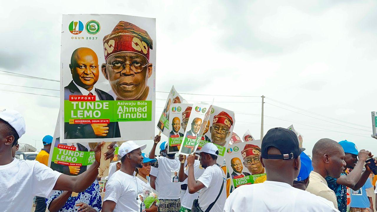 Supporters holding the posters showing Prsident Tinubu and Tunde Lemo