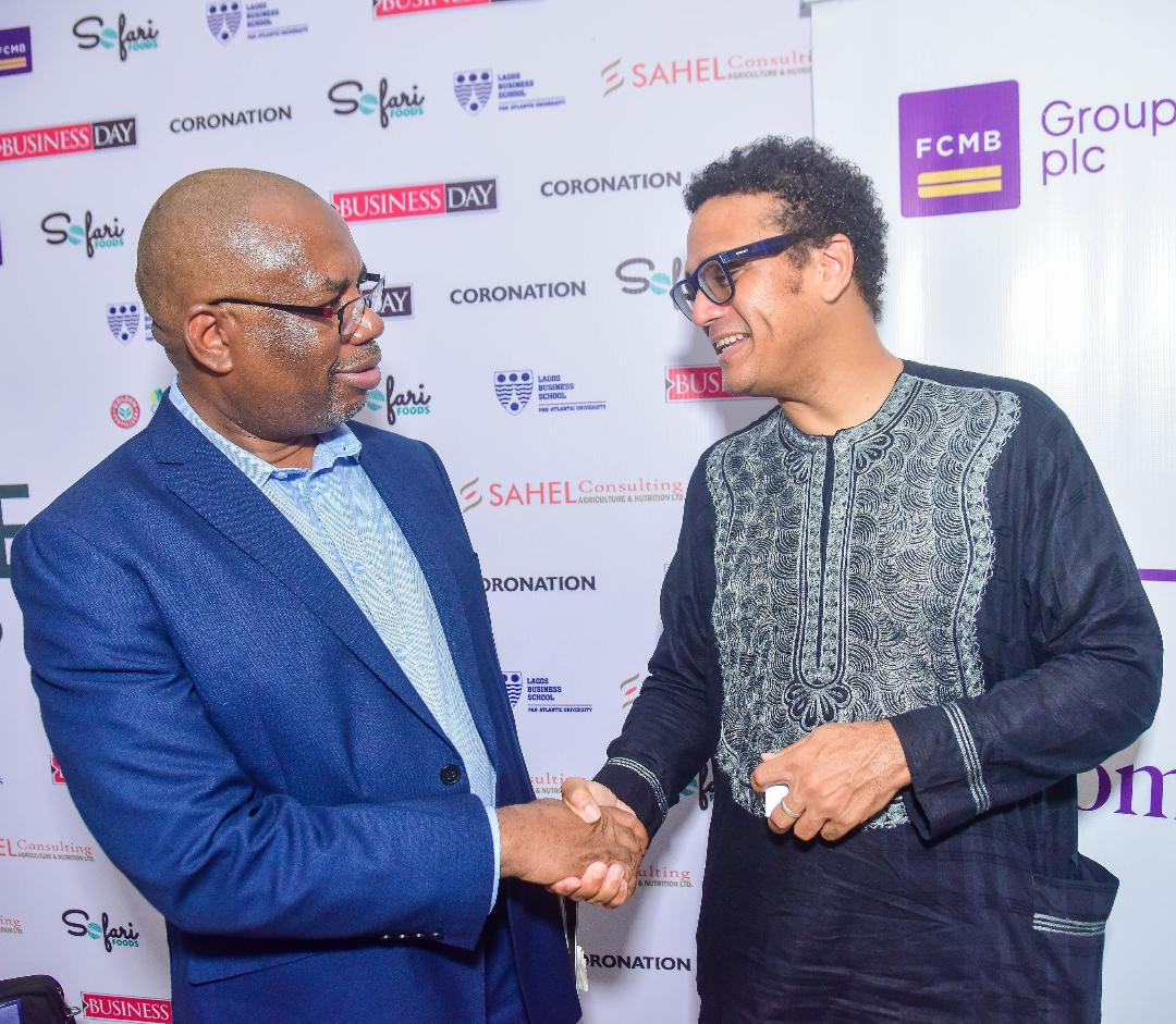Divisional Head, Agribusiness and Non-Oil Exports, First City Monument Bank (FCMB), Mr. Kudzai Gumunyu (left), and Managing Director, Baban Gona, Mr. Kola Masha, at the BusinessDay Future of Agriculture Conference held in Lagos, recently.