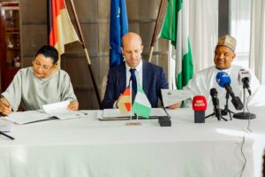 L-R: Minister of State, Budget and Economic Planning, Dr Doris Uzoka-Anite; Deputy Director-General of Germany’s Federal Ministry for Economic Cooperation and Development (BMZ), Mr Philip Knill; and Minister of Budget and Economic Planning, Senator Abubakar Bagudu, during the signing of the Summary Record of the Nigeria-Germany Government Negotiation on Development Cooperation in Abuja on Thursday, 14/05/26. PHOTO: FMBEP