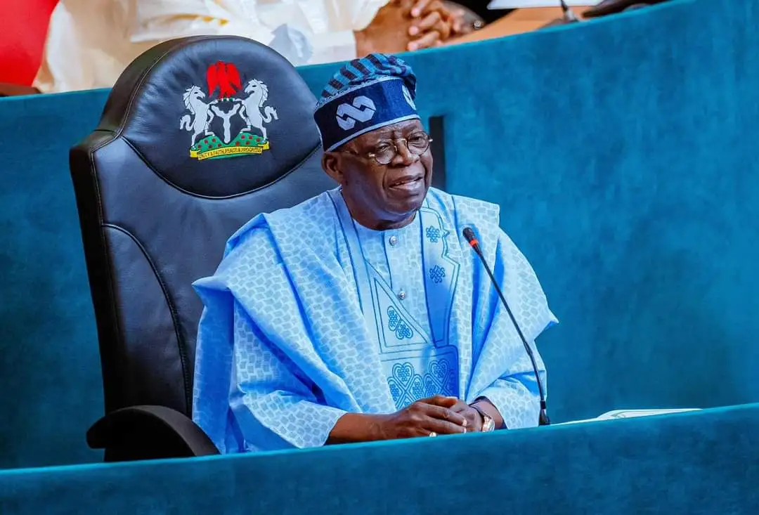 President Bola Tinubu greets Nigerians